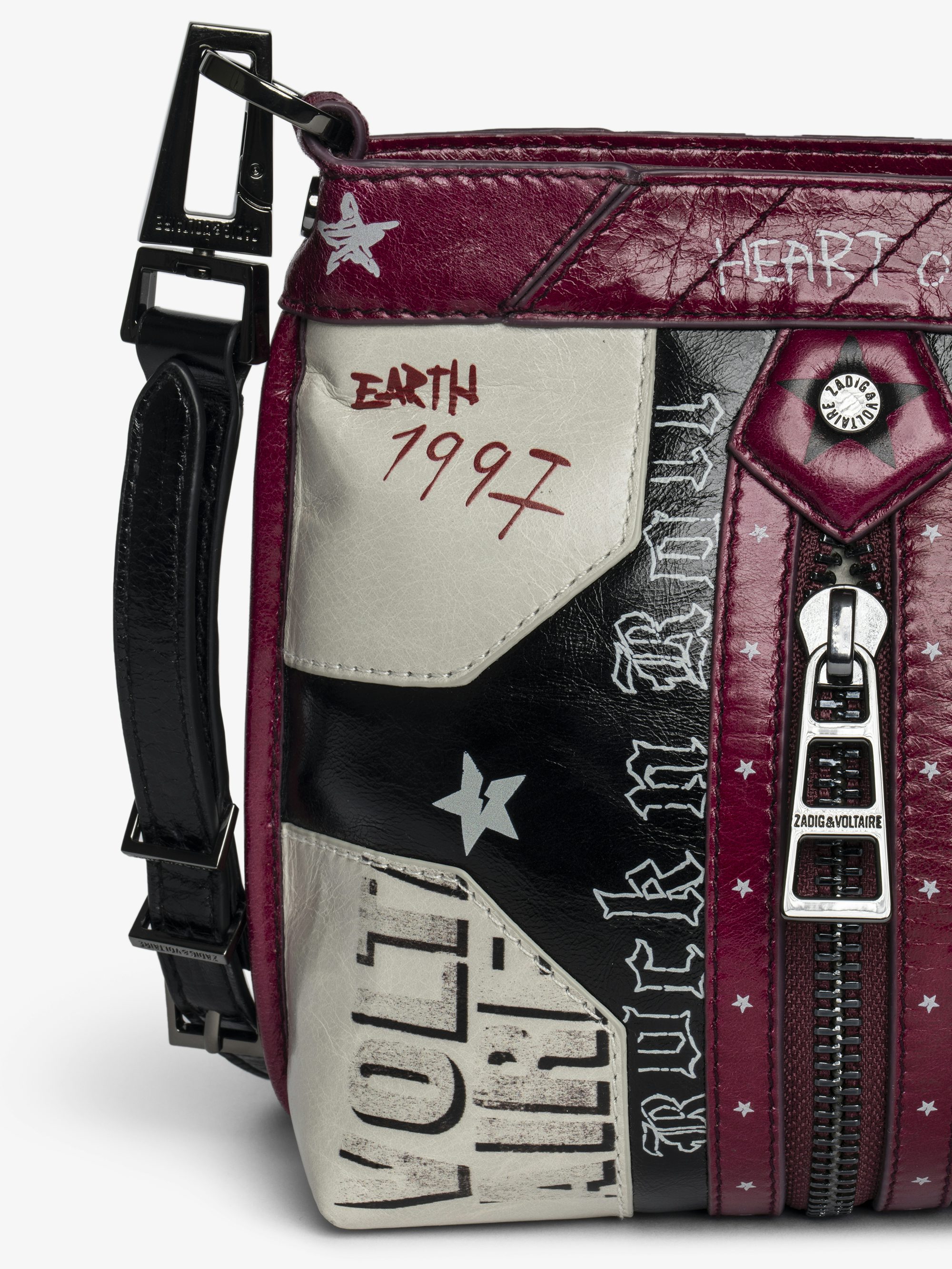 Sunny Moody Punk Bag - Vintage-inspired patent leather bag with adjustable shoulder strap and wing signature.